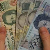 Đồng bolivar mất giá, kinh tế Venezuela cận kề siêu lạm phát