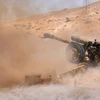 Binh lính Syria nã pháo về phía phiến quân IS. (Nguồn: AFP)