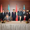 Lễ ký Chương trình hợp tác giai đoạn 2015-2017 giữa Bộ Tư pháp Việt Nam và Bộ Tư pháp Kazakhstan. (Ảnh: Đức Tám/TTXVN)