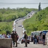 Một trạm kiểm soát an ninh được thiết lập gần Artemivsk (vùng Donetsk), khu vực do chính quyền Kiev kiểm soát ngày 26/5. (Nguồn: AFP/ TTXVN)