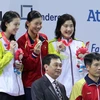 VĐV Nguyễn Thị Ánh Viên (giữa) đã xuất sắc đoạt hai huy chương vàng ở hai nội dung 800m tự do và 400m hỗn hợp nữ của môn Bơi tại SEA Games 28. (Nguồn: Quốc Khánh/TTXVN)
