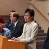 Trong ảnh: Trưởng Đặc khu hành chính Hong Kong, bà Lâm Trịnh Nguyệt Nga (giữa) tại cuộc họp báo ở Hong Kong, Trung Quốc, ngày 5/9. (Nguồn: THX/TTXVN)