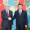 Chủ tịch Trung Quốc Tập Cận Bình (phải) và Tổng thống Kazakhstan Kassym-Jomart Tokayev. (Nguồn: xinhuanet)