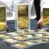 Trong ảnh: Vàng miếng được trưng bày tại một sàn giao dịch ở Seoul ngày 19/7/2019. (Nguồn: Yonhap/TTXVN)