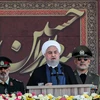 Trong ảnh: Tổng thống Iran Hassan Rouhani (giữa) phát biểu tại lễ diễu binh kỷ niệm cuộc chiến tranh Iran - Iraq, tại Tehran ngày 22/9/2019. (Nguồn: AFP/TTXVN)