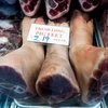 Trong ảnh: Thịt lợn được bày bán tại một khu chợ ở Washington, DC, Mỹ. (Nguồn: AFP/TTXVN)