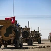 Trong ảnh: Xe quân sự của Mỹ và Thổ Nhĩ Kỳ tuần tra tại ngoại ô thị trấn Tal Abyad (Syria), giáp giới với Thổ Nhĩ Kỳ ngày 8/9/2019. (Nguồn: AFP/TTXVN)