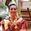 Nhân dân Lào vui đón Tết cổ truyền Bunpimay 2014