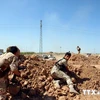 Anh cấp tốc huấn luyện lực lượng người Kurd dùng súng máy hạng nặng