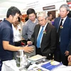 10 gian hàng Việt Nam tham dự Hội chợ Công nghệ Lào 2014