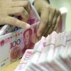 Trung Quốc: Hoạt động thanh toán mậu biên bằng đồng NDT tăng