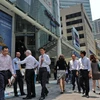 Singapore sẽ thắt chặt thị trường lao động trong năm 2015