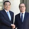 Tổng thống Pháp Francois Hollande (phải) và Thủ tướng Lý Khắc Cường trước cuộc gặp ở Paris. (Nguồn: AFP/TTXVN)