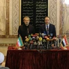 Chủ tịch Quốc hội Syria Mohammad al-Lahham (phải) tại cuộc gặp với Chủ tịch Quốc hội Iran Ali Larijani. (Nguồn: AFP/TTXVN)