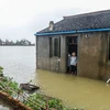 Cảnh ngập lụt do mưa lớn sau khi bão Chan-hom quét qua làng Chejiu, tỉnh Chiết Giang. (Nguồn: THX/TTXVN)
