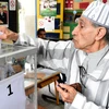 Cử tri Maroc bỏ phiếu tại một điểm bầu cử ở thủ đô Rabat. (Nguồn: AFP/TTXVN) 