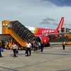 Máy bay của Vietjet Air trả khách tại sân bay Liên Khương (Lâm Đồng). (Ảnh minh họa: Huy Hùng/TTXVN)