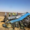 Mảnh vỡ máy bay Nga A321 tại khu vực Hassana, phía bắc Ai Cập. (Nguồn: THX/TTXVN)