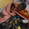 Một nạn nhân bị thương trong trận động đất được điều trị tại bệnh viện ở Siliguri. (Nguồn: AFP/TTXVN)