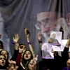 Người dân Iran thể hiện lòng trung thành với Đại Giáo chủ Khamenei. (Nguồn: AP)