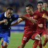 Các hậu vệ Việt Nam sẽ phải đặc biệt thận trọng trước Thái Lan trong những phút cuối trận. (Ảnh: AFP)