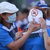 Cổ động viên Than Quảng Ninh bỏ trống khán đài B sân Cẩm Phả để phản đối lệnh cấm sử dụng loa đài của VPF đưa ra. (Ảnh: Đăng Huỳnh/Vietnam+)