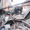 Toàn cảnh ngôi nhà 4 tầng bị sập ở Cửa Bắc. (Ảnh: Minh Sơn/Vietnam+)