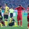 Thảm bại 2-4 trước Malaysia ở Mỹ Đình tại bán kết AFF Cup 2014 trước 40.000 khán giả nhà là một trong những trận thua tồi tệ nhất lịch sử thể thao Việt Nam. (Ảnh: Minh Chiến/Vietnam+)
