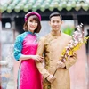 Vũ Thị Trang đang hạnh phúc bên người chồng, đồng nghiệp, đàn anh Nguyễn Tiến Minh. (Ảnh: Facebook nhân vật)