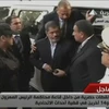 Tổng thống Mohamed Morsi (giữa) tới tòa án tại Cairo ngày 4/11. (Nguồn: AFP/TTXVN)