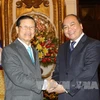 Phó Thủ tướng Lào làm việc với Ngân hàng Nhà nước