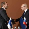 Bộ trưởng Kinh tế Phần Lan Jan Vapaavuori (trái) và Giám đốc điều hành Rosatom (Nga) Sergei Kiriyenko. (Nguồn: finlandtimes.fi)