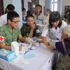 Cục quân y Việt Nam-Singapore hợp tác khám chữa bệnh nhân đạo