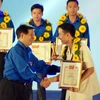 Nguyên Chủ tịch nước Nguyễn Minh Triết nhận Huy hiệu 50 năm tuổi Đảng