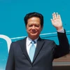 Thủ tướng Nguyễn Tấn Dũng đến sân bay Kokshetau (Kazakhstan). (Ảnh: Đức Tám/TTXVN)