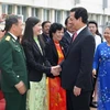 Thủ tướng Nguyễn Tấn Dũng và Phu nhân đến thăm cán bộ, nhân viên Đại sứ quán Việt Nam và gặp gỡ đại diện cộng đồng người Việt Nam tại Bulgaria. (Ảnh: Đức Tám/TTXVN)
