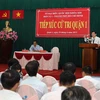 Chủ tịch nước Trương Tấn Sang tiếp xúc cử tri quận 1 (TP.Hồ Chí Minh) để thông báo kết quả kỳ họp thứ 9, Quốc hội khoá XIII. (Ảnh: Nguyễn Khang/TTXVN)