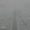 Cảnh khói mù bao phủ thành phố Thạch Gia Trang, thủ phủ tỉnh Hà Bắc ngày 9/10. (Nguồn: THX/TTXVN)