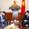 Phó Thủ tướng, Bộ trưởng Bộ Ngoại giao Phạm Bình Minh tiếp Đại sứ Algeria Mohamed Berrah. (Ảnh: Thống Nhất/TTXVN)