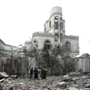 Nhà cửa bị phá hủy sau đợt không kích ở thủ đô Sanaa ngày 6/7. (Nguồn: AFP/TTXVN)