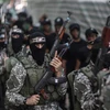 Các chiến binh Hamas tại lễ bế mạc đợt huấn luyện tại trại mùa hè ở thành phố Gaza ngày 5/8. (Nguồn: THX/TTXVN)