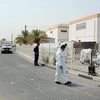 Cảnh sát điều tra tại hiện trường một vụ đánh bom ở Bahrain. (Nguồn: THX/TTXVN)