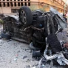 Hiện trường một vụ đánh bom ở Tripoli. (Nguồn: THX/TTXVN)