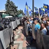 Xung đột giữa người biểu tình và cảnh sát Ukraine tại Kiev ngày 31/8. (Nguồn: AFP/TTXVN)