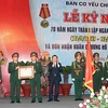 Chủ tịch nước Trương Tấn Sang trao tặng Huân chương Hồ Chí Minh cho ngành cơ yếu Việt Nam. (Ảnh: Nguyễn Khang/TTXVN)