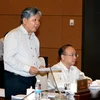Bộ trưởng Bộ Tư pháp Hà Hùng Cường phát biểu ý kiến. (Ảnh: Phạm Kiên/TTXVN)