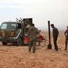 Binh sỹ Syria tại làng Jihar sau chiến dịch truy quét ngày 8/3. (Nguồn: AFP/TTXVN)