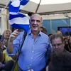 Lãnh đạo Đảng Dân chủ mới Vangelis Meimarakis (giữa) trong cuộc vận động tranh cử tại thủ đô Athens ngày 19/9. (Nguồn: AFP/TTXVN)