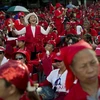 Hàng nghìn người Áo đỏ thuộc Mặt trận Thống nhất dân chủ chống độc tài (UDD). (Nguồn: AFP/TTXVN)