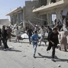 Hiện trường đổ nát do xung đột tại làng Kafruma, tỉnh Idlib ngày 24/9. (Nguồn: Reuters/TTXVN)